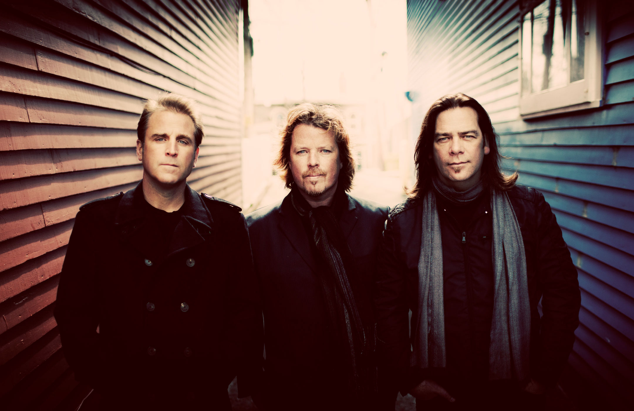 Great Big Sea band picture in an urban setting.