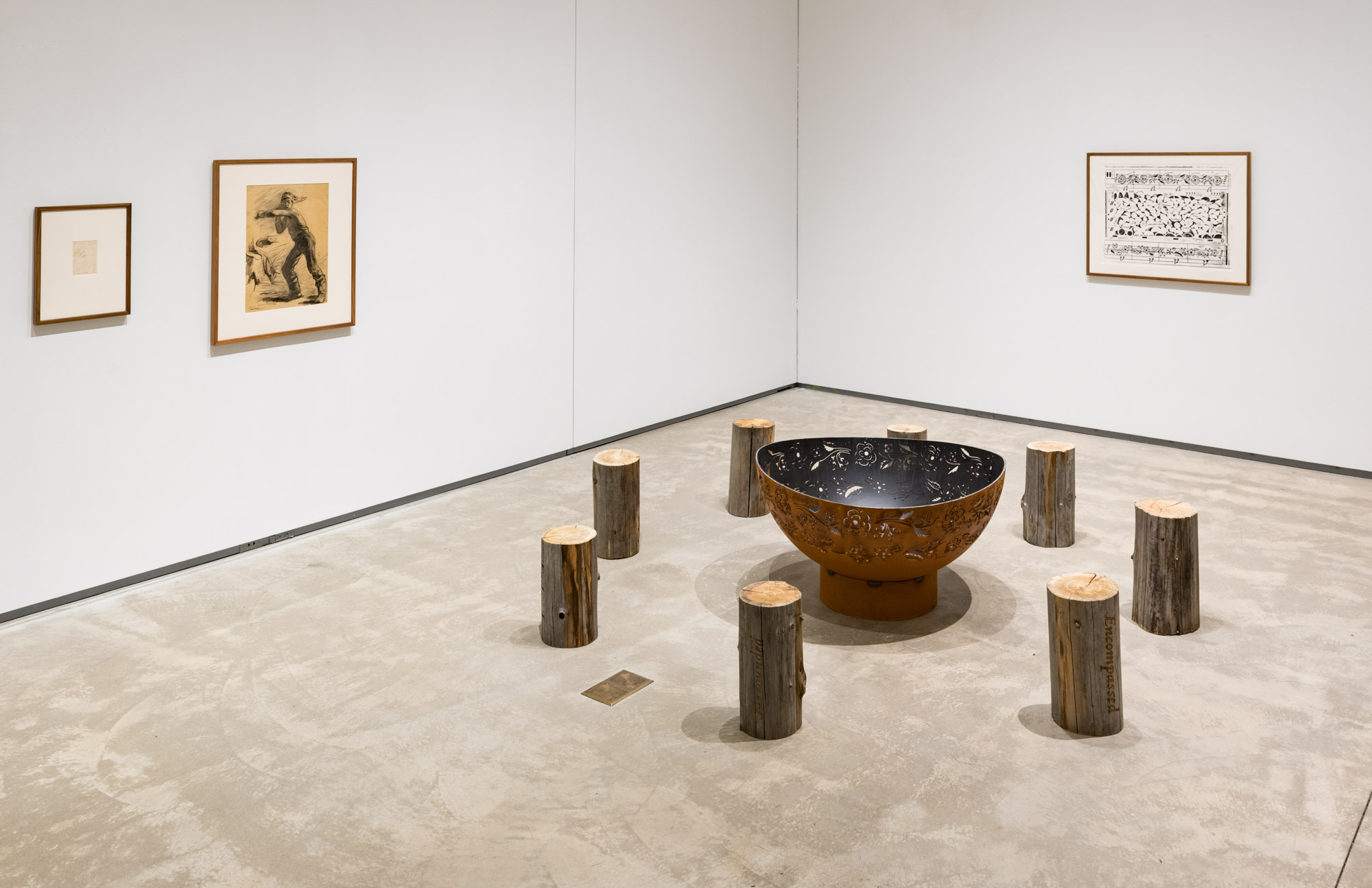 Tania Willard, Surrounded/Surrounding, 2018, wood burning fire ring, laser etched cedar woodlogs from SecwépemcTerritory