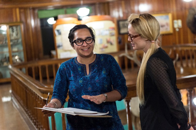 Guest artist Virginia Lee Montgomery with a Drawn to Nature participant at Banff Park Museum. Photo by Rita Taylor, 2016