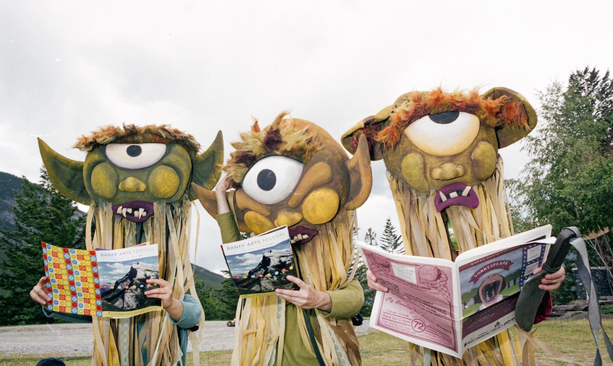 Three trolls try to decide which performances to attend during the Banff Arts Festival before they turn to