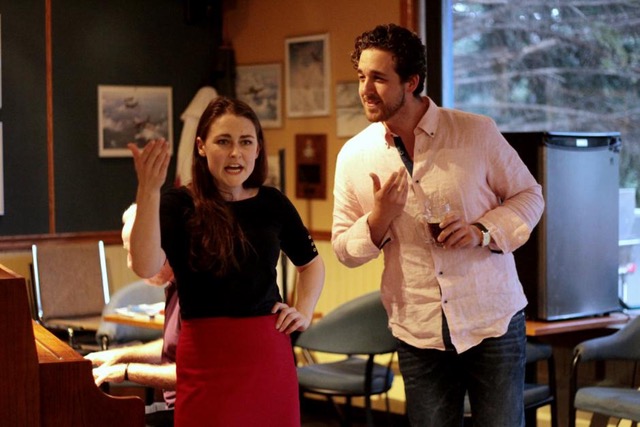 Opera singers perform in a pub setting wearing casual clothes.