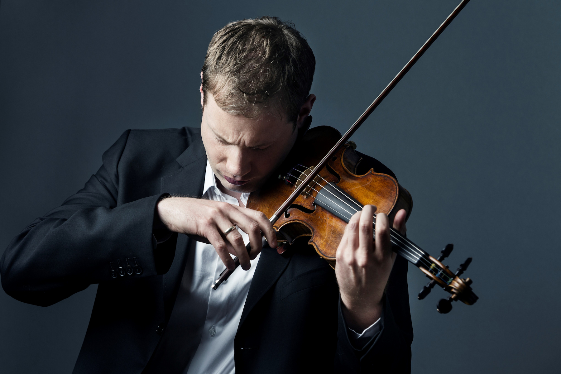 A man plays a violin
