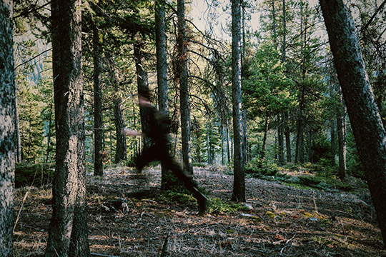 Image of Scott Silven walking through the woods