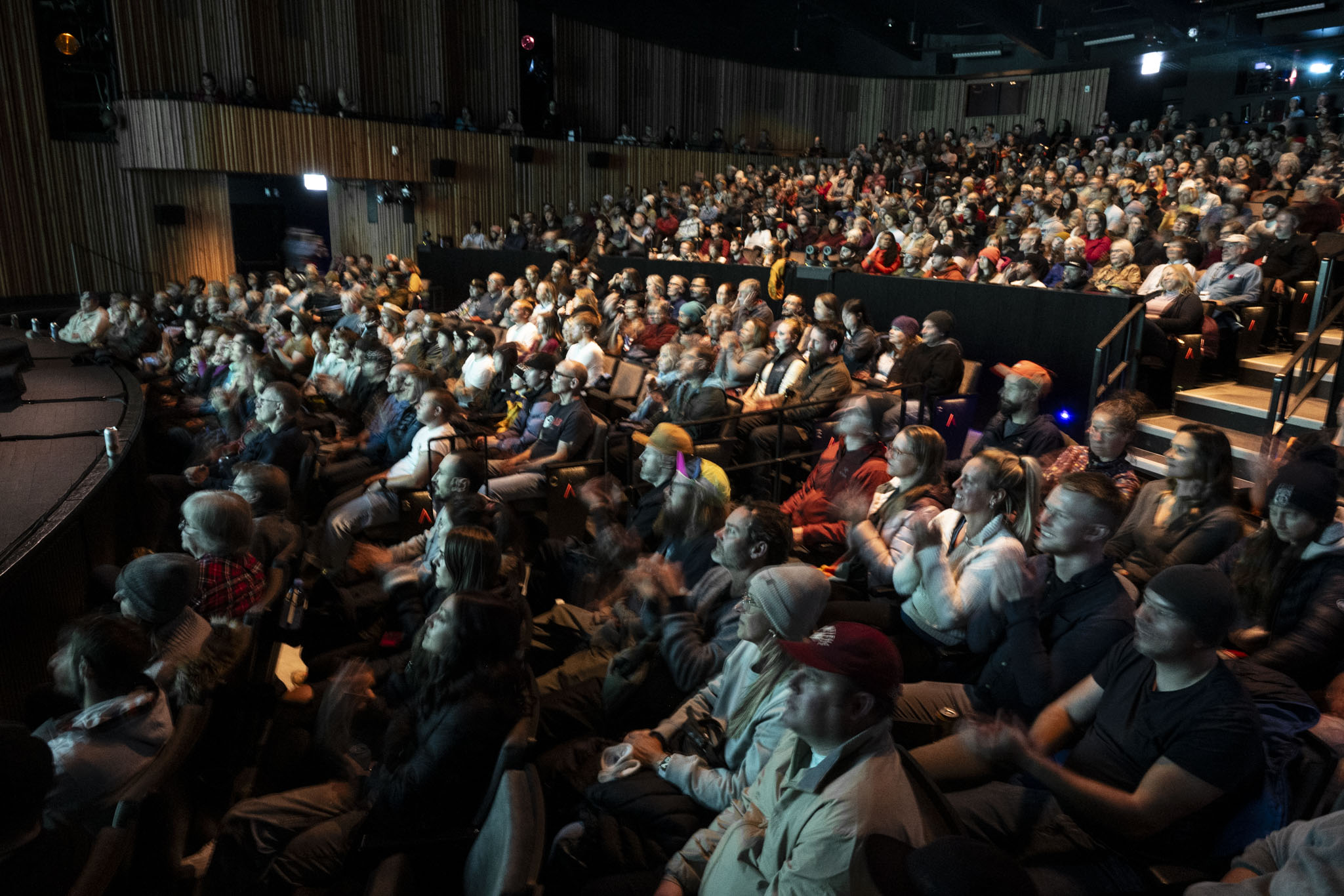 An audience photo of people enjoying a film in the Jenny Belzberg Theatre