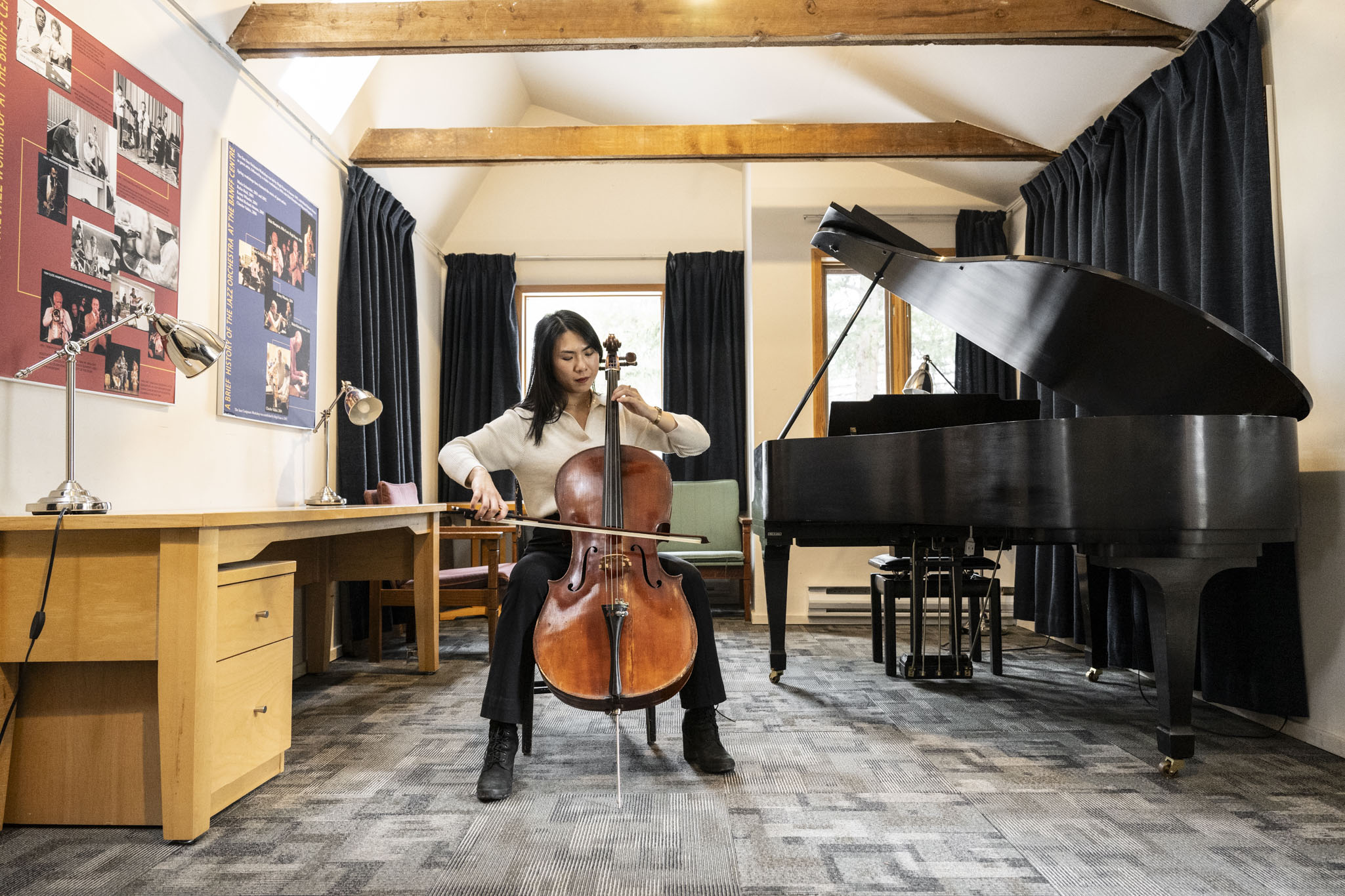 A cellist inside one of the Music Huts at Banff Centre. Photo Credit: Rita Taylor