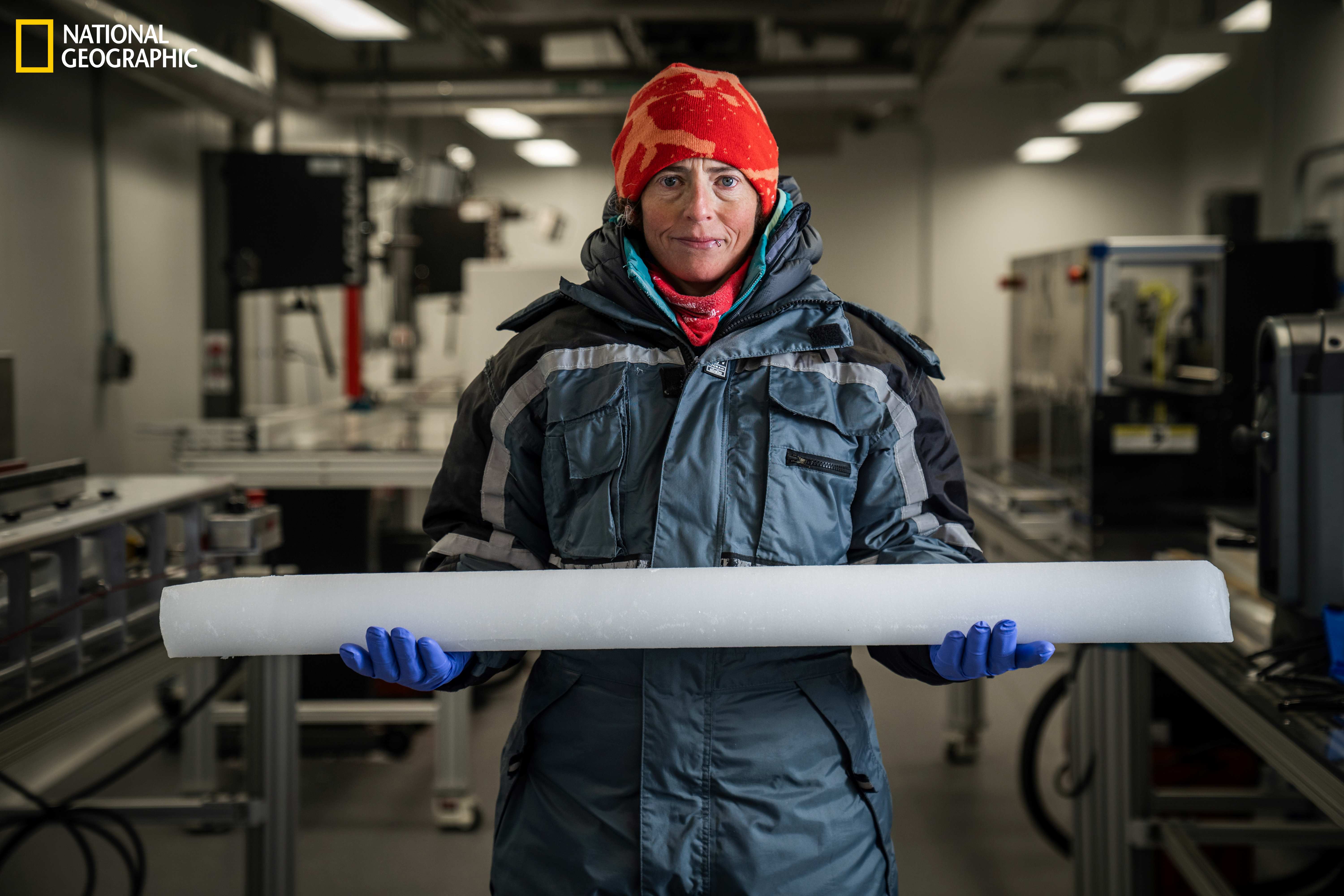 National Geographic Explorer Alison Criscitiello holds a portion of her 2022 Mt. Logan ice core in the Canadian Ice Core Lab at the University of Alberta. Credit: Leo Hoorn/National Geographic