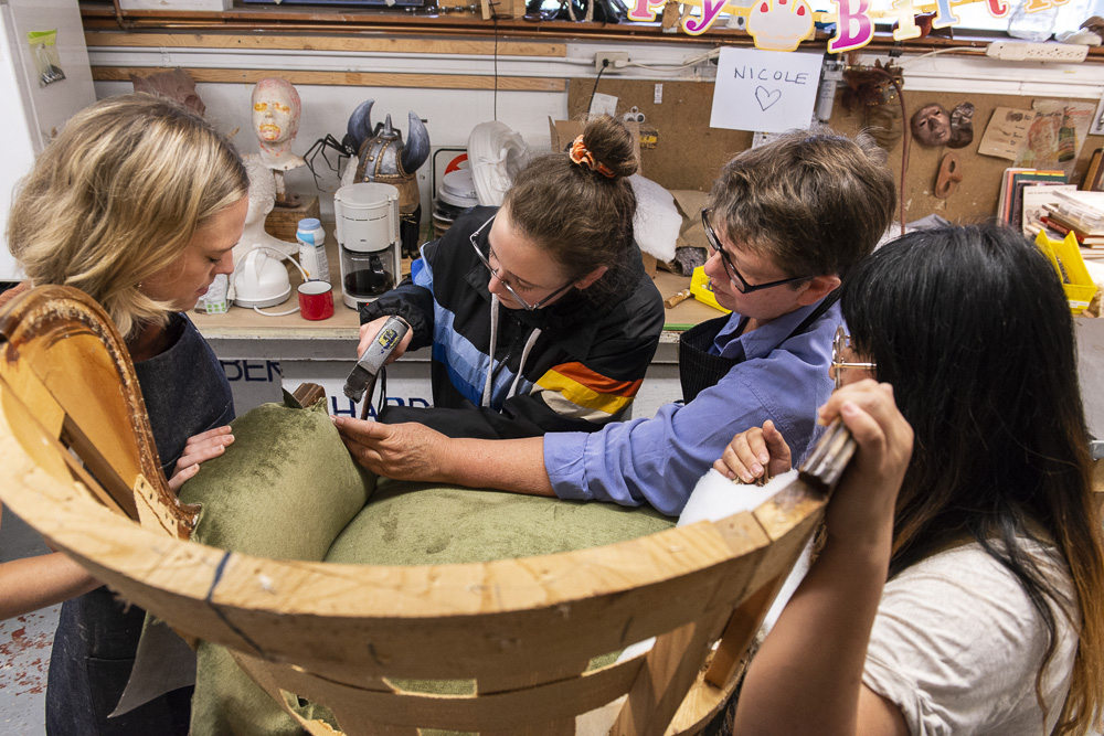 Practicum participants working during a prop building workshop at Banff Centre