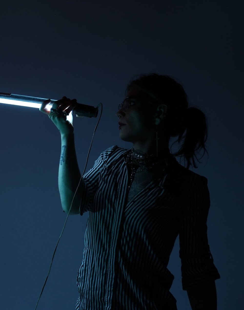 Portrait of Victoria Bell in profile.