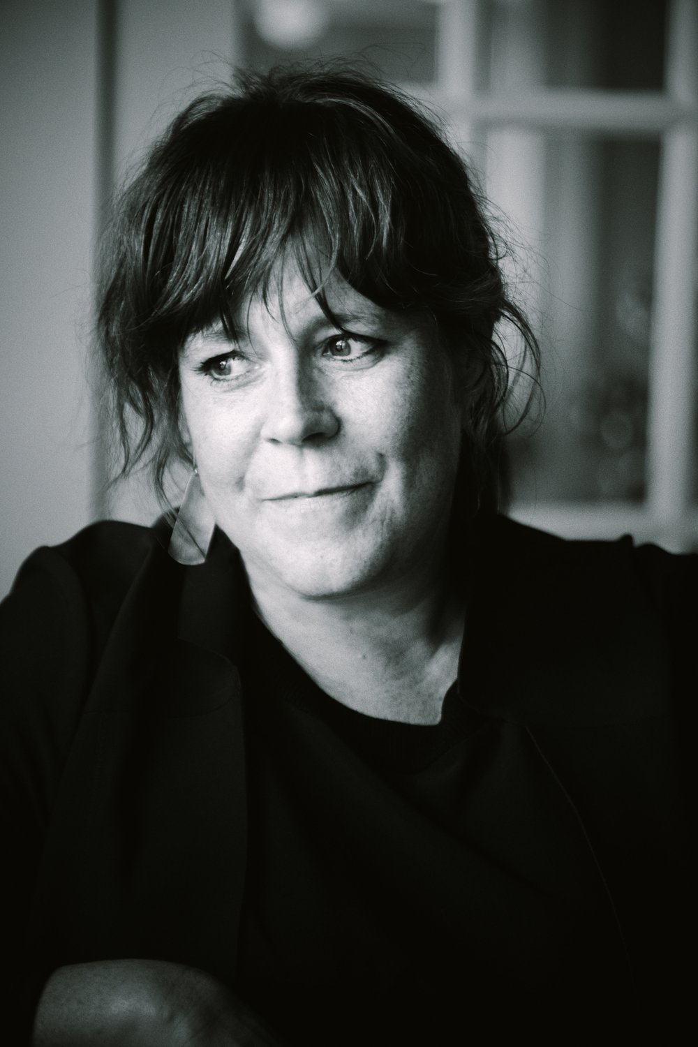 Black and white photo of woman looking off to the side 