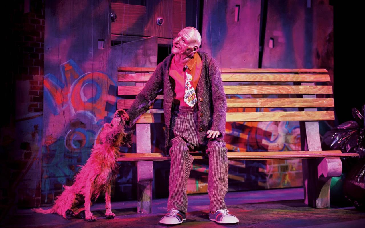 Image of a marionette of wonderful Joe and his dog