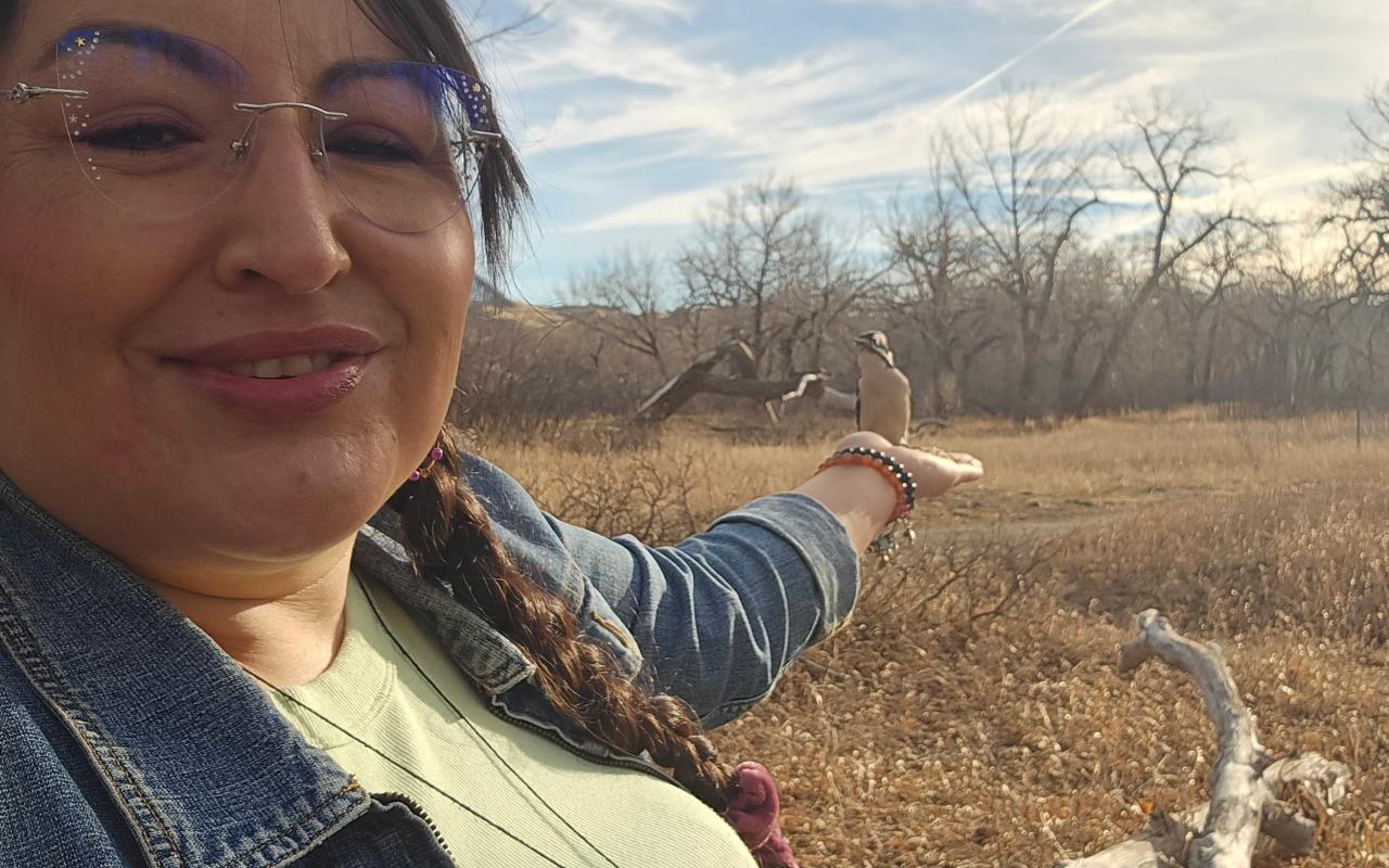 Photo of Indigenous woman out on the land