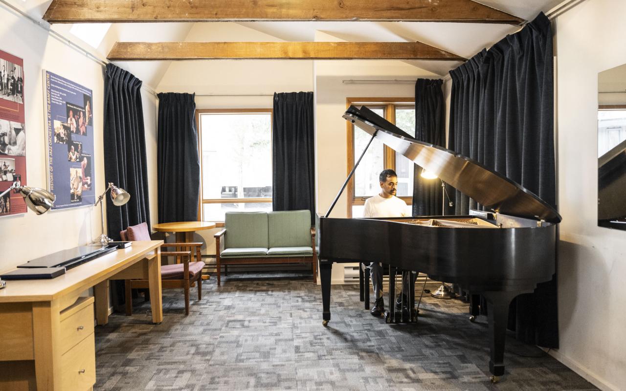 A pianist inside one of the Music Huts at Banff Centre. 