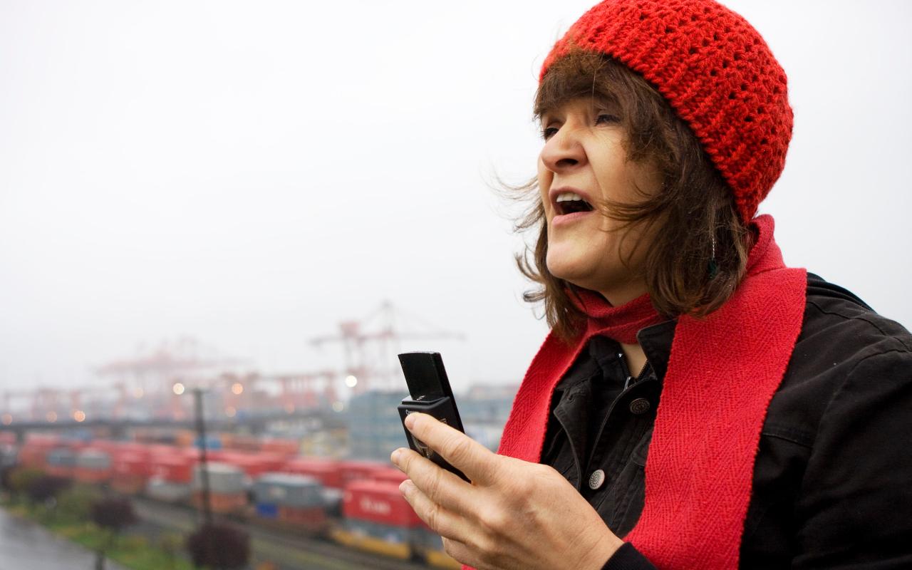 Image of person wearing red hat and scarf