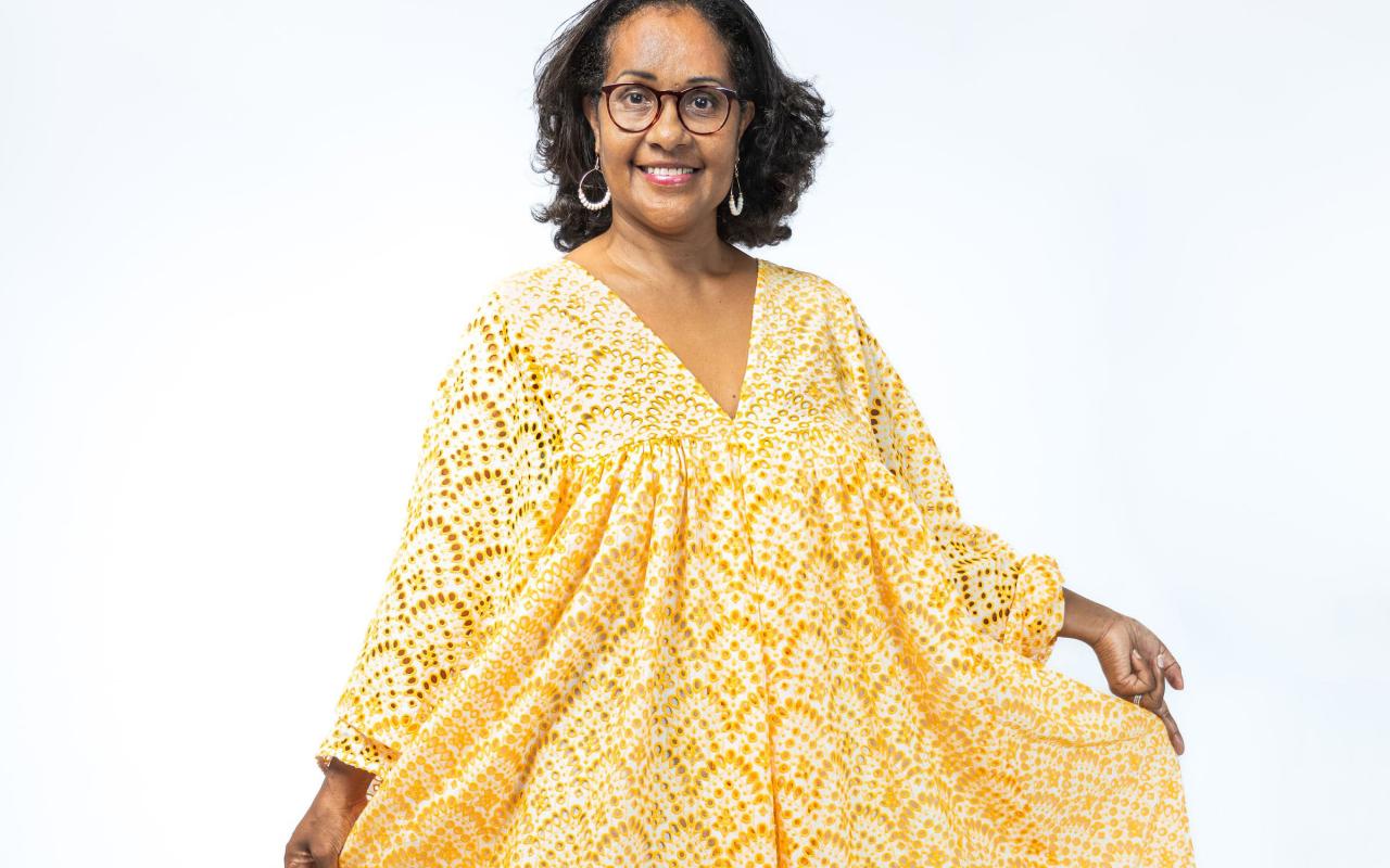 Photo of woman in handmade yellow dress