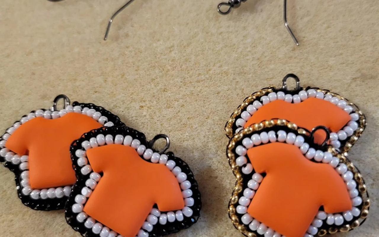 Photo of orange shirt earrings by Silver & Ivy Beads
