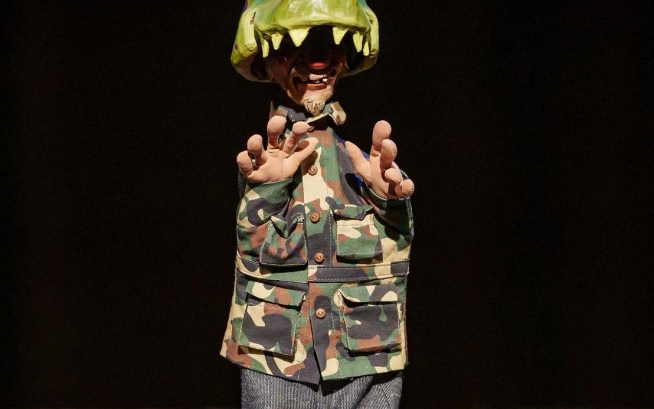 Image of Sketch in his “Tyrannosaurus Sketch” mask.