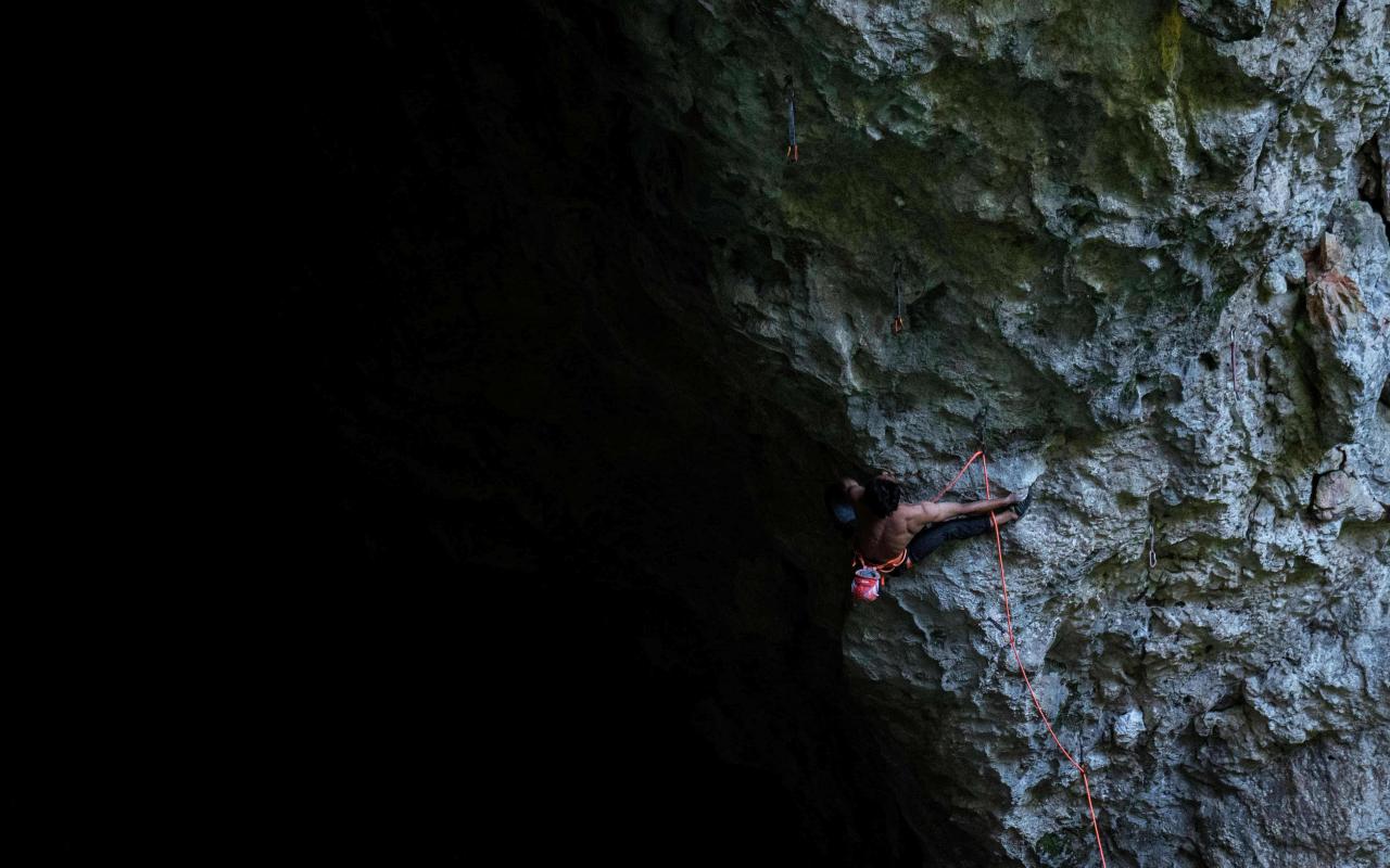 climber on an overhand wall 