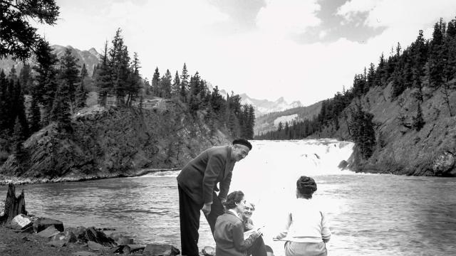 Walter J. Phillips with landscape painting students at the base of Bow Falls in 1947