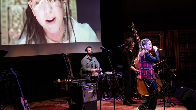 Niña Dioz sings on stage during a Banff Musicians In Residence concert, Banff Centre 2023