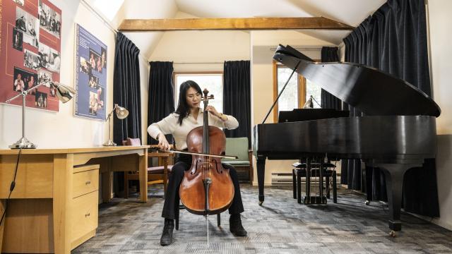 A cellist inside one of the Music Huts at Banff Centre. Photo Credit: Rita Taylor