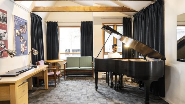 A pianist inside one of the Music Huts at Banff Centre. 