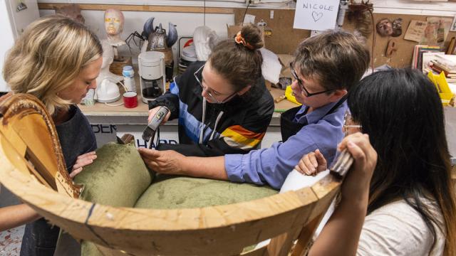 Practicum participants working during a prop building workshop at Banff Centre