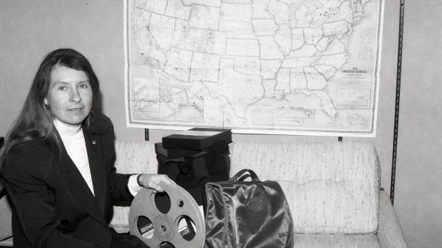 Bernadette McDonald with a film reel in 1991. Courtesy of the Paul D. Fleck Library and Archives.
