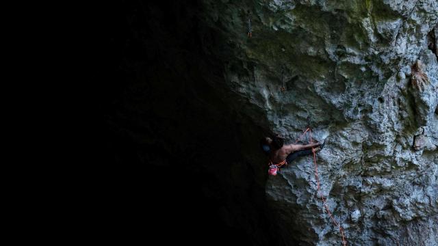 climber on an overhand wall 