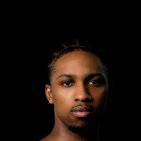 portrait of dancer shoulders up looking directly at camera