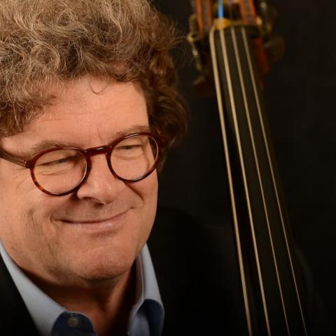 Headshot of Joel Quarrington, photo by Fred Cattroll