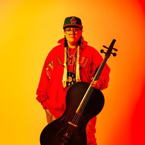 Image of Cris Derksen and instrument