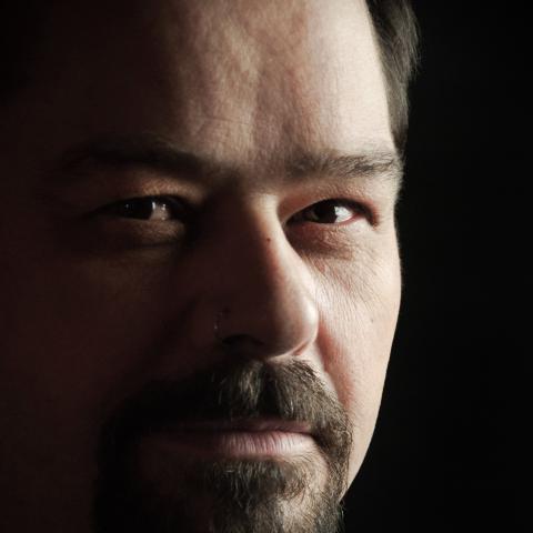 Men with mustache in a black t-shirt