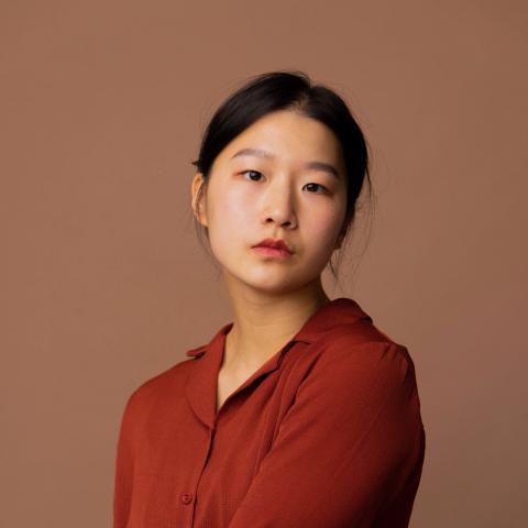 Asian women in red loose shirt