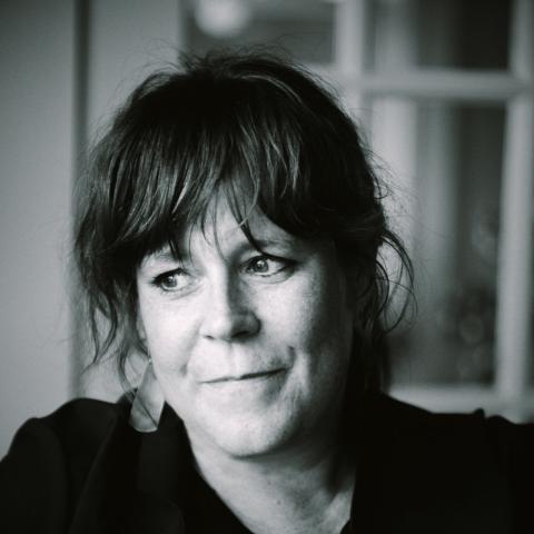 Black and white photo of woman looking off to the side 